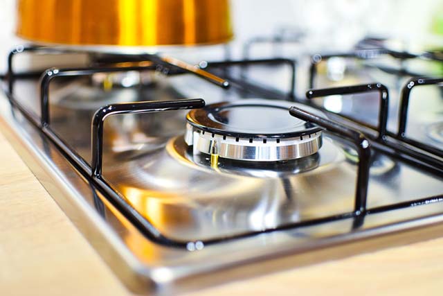 shiny kitchen stove, cleaned by shiny cleaning crew.